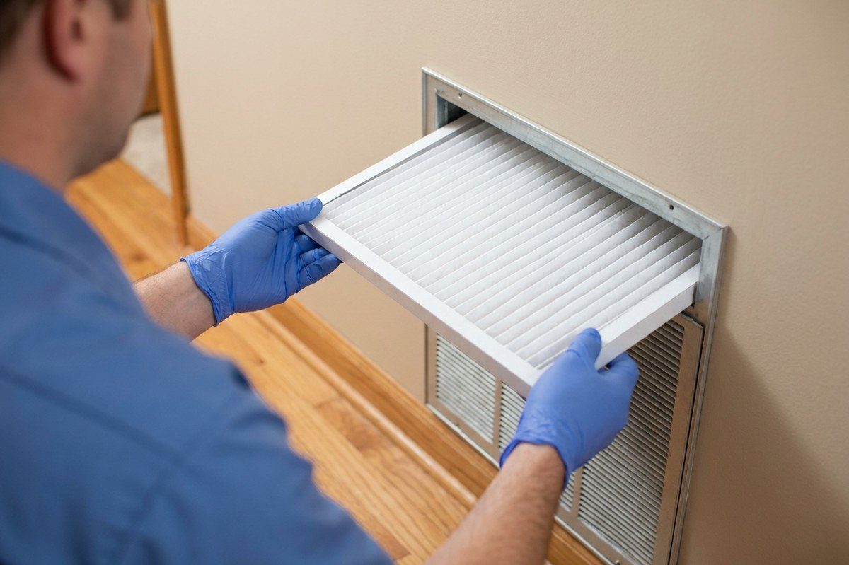 HVAC Maintenance technician at work